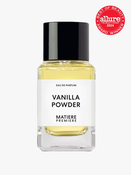 parfum in branded clear bottle with black cap on light gray background with red and white 2024 allure best of beauty seal